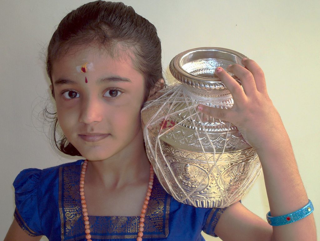 Pongal Celebration by girl 10 Interesting facts about Makar Sankranti you did not know, IndianYug